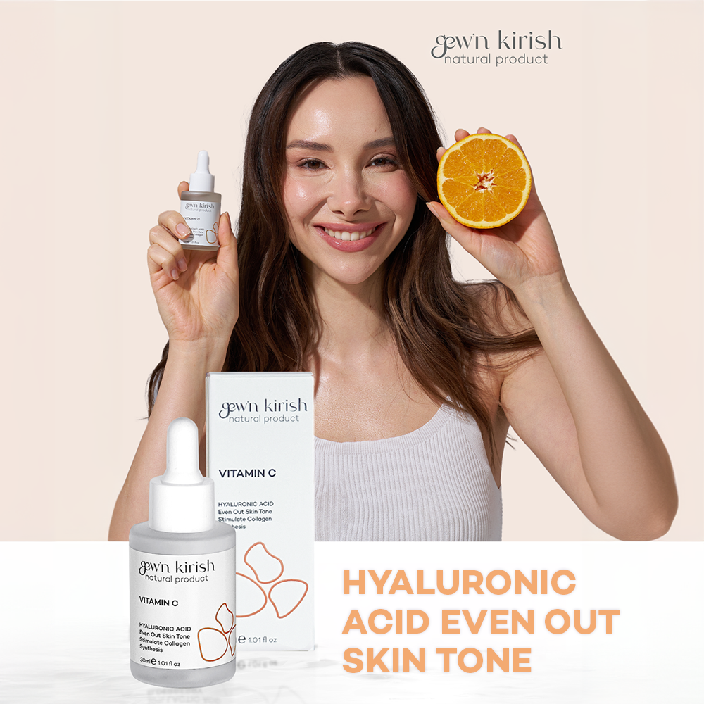 Woman holding skincare products and an orange with 'gewn kirish' branding on a beige background